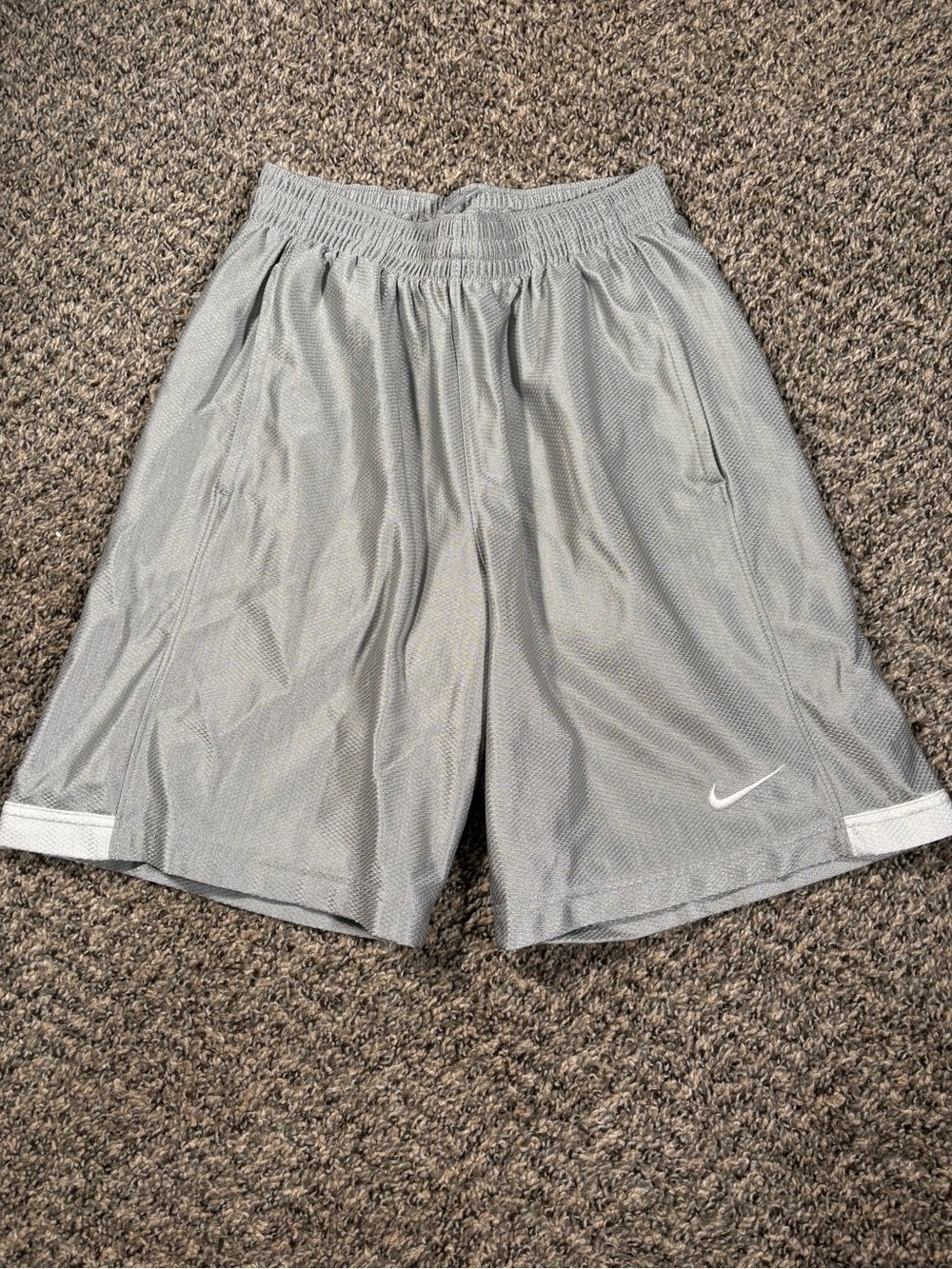 Nike Gray Mesh Athletic Shorts with White Swoosh